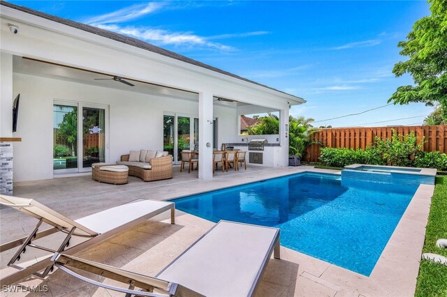 view of pool featuring a patio area, area for grilling, outdoor lounge area, an in ground hot tub, and ceiling fan