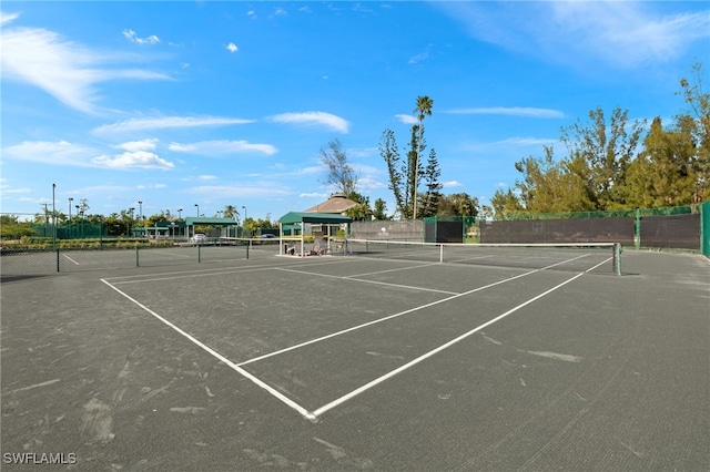 view of sport court with a gazebo