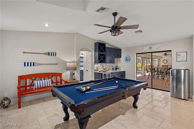 rec room with ceiling fan, bar, billiards, and lofted ceiling