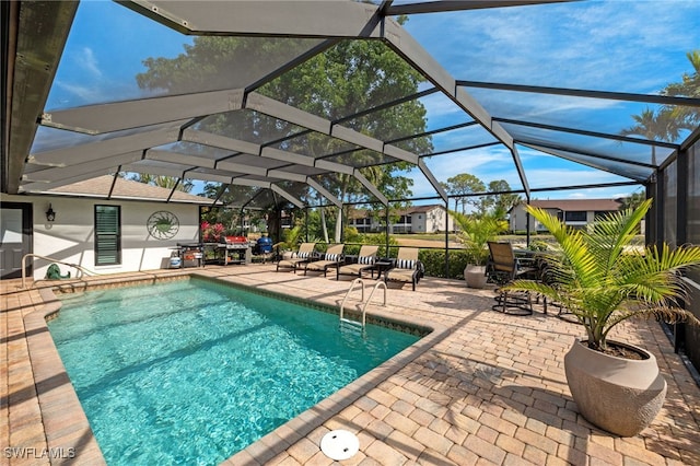 view of pool featuring a lanai and a patio area