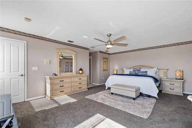 bedroom with ornamental molding, dark carpet, and ceiling fan