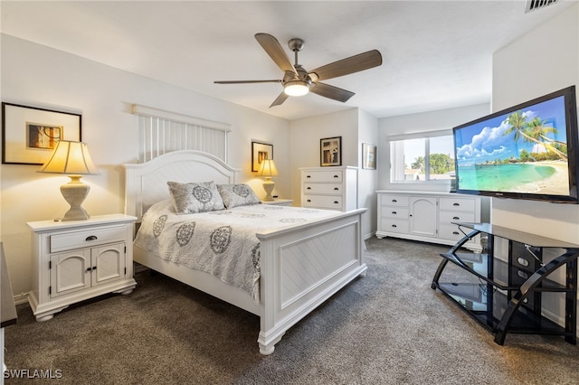 carpeted bedroom featuring ceiling fan