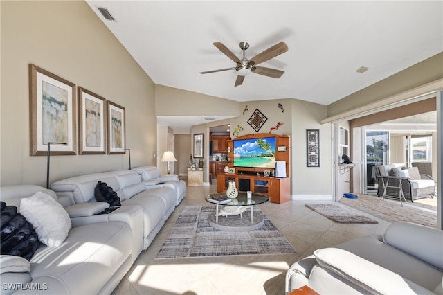 tiled living room featuring lofted ceiling and ceiling fan