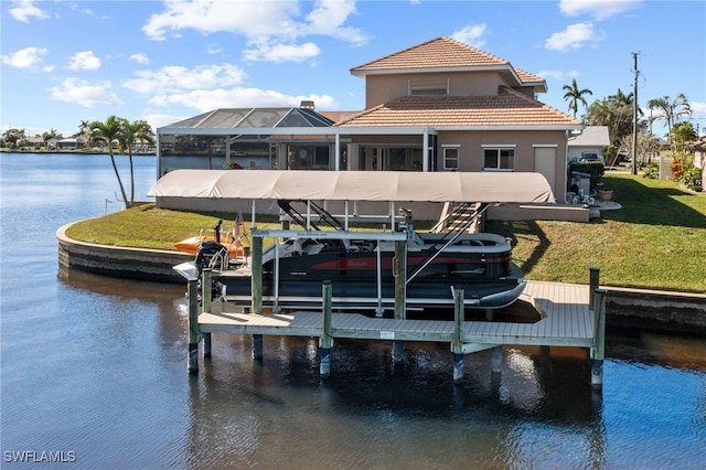 view of dock featuring a water view, a yard, and glass enclosure