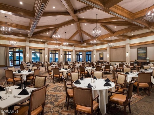 dining area with beam ceiling, coffered ceiling, and a chandelier