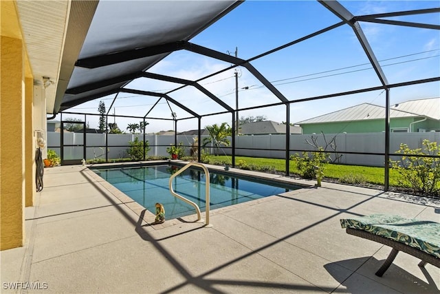 view of pool featuring a patio, a lanai, and a yard