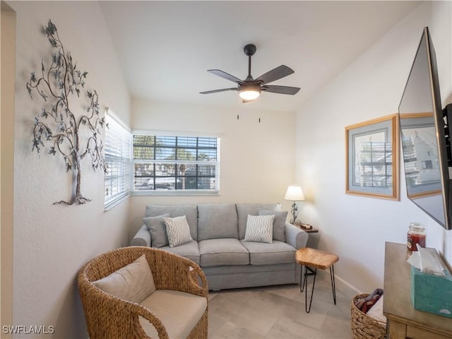 living room with ceiling fan