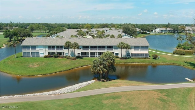 birds eye view of property featuring a water view