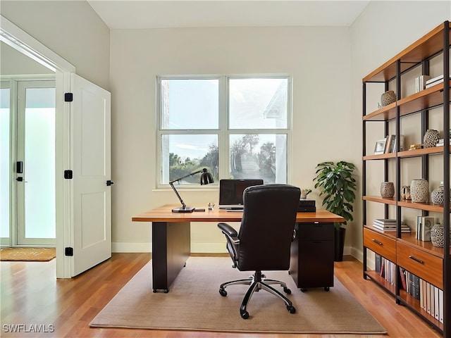 5006 S Peachtree Cir, Labelle, FL 33935 - office with light wood finished floors and baseboards
