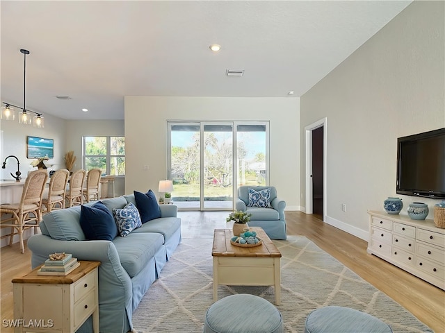 5006 S Peachtree Cir, Labelle, FL 33935 - living area with light wood-style flooring, baseboards, and recessed lighting