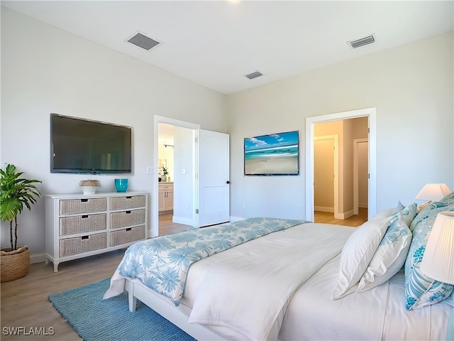 5006 S Peachtree Cir, Labelle, FL 33935 - bedroom with light wood-style flooring and baseboards