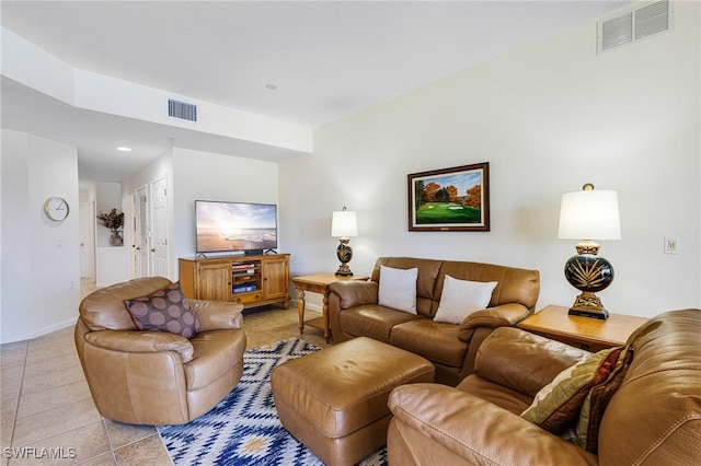 living room with light tile patterned flooring