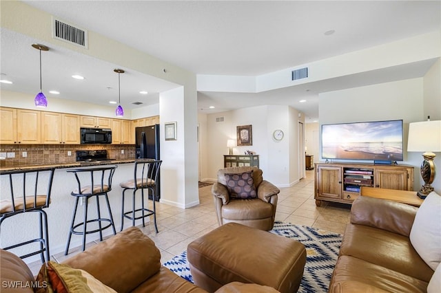 living room featuring light tile patterned floors