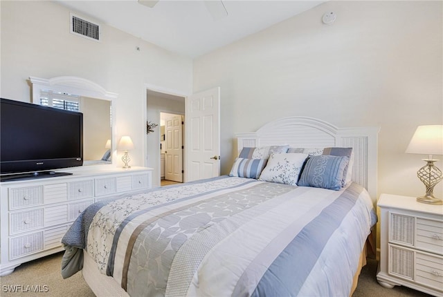 carpeted bedroom featuring ceiling fan