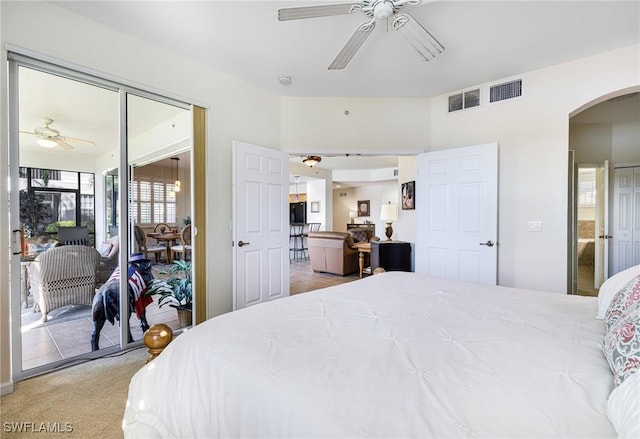 bedroom with access to exterior, carpet floors, and ceiling fan