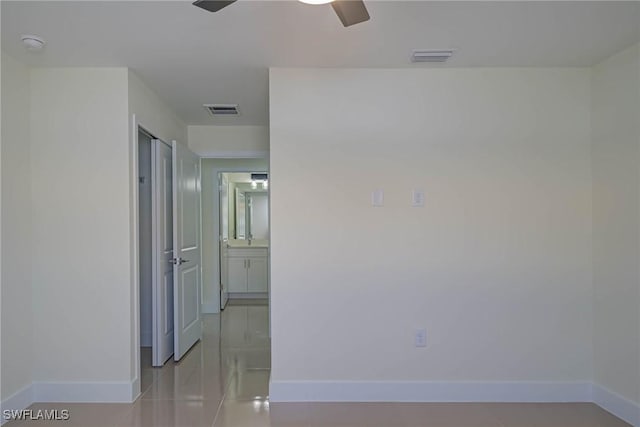 interior space with visible vents and baseboards