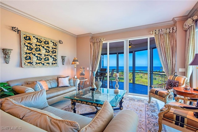 living room with crown molding and a water view