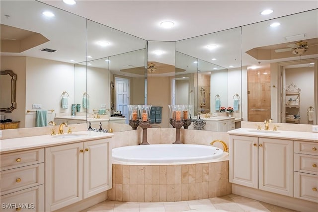 bathroom with independent shower and bath, vanity, tile patterned floors, and ceiling fan