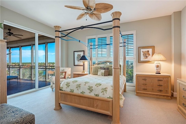 bedroom featuring light carpet, access to outside, and ceiling fan