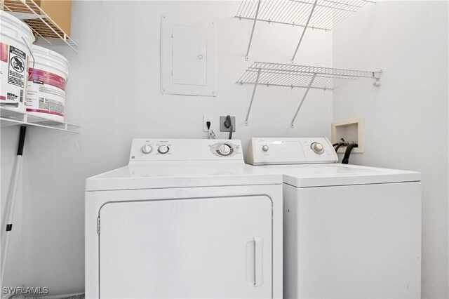 12658 Kenwood Ln Unit D, Fort Myers, FL 33907 - laundry room featuring separate washer and dryer