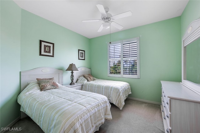 bedroom featuring light carpet and ceiling fan