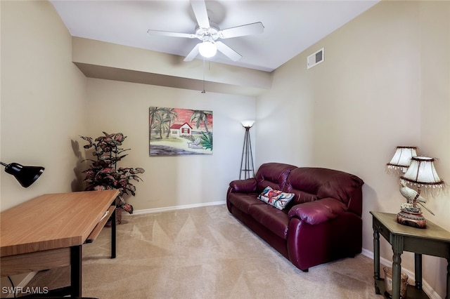 sitting room featuring light carpet and ceiling fan