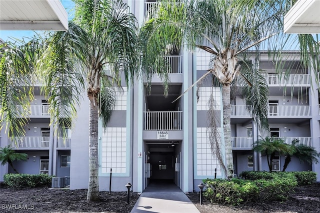 view of building exterior with central AC