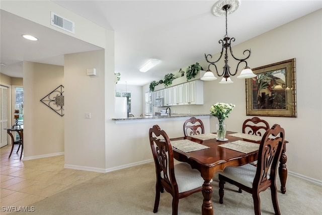 dining space with light tile patterned flooring