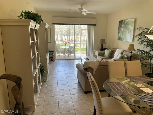 tiled living room with ceiling fan