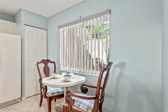 dining room with light tile patterned floors