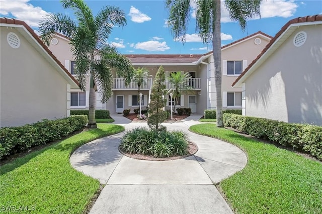 surrounding community featuring a yard