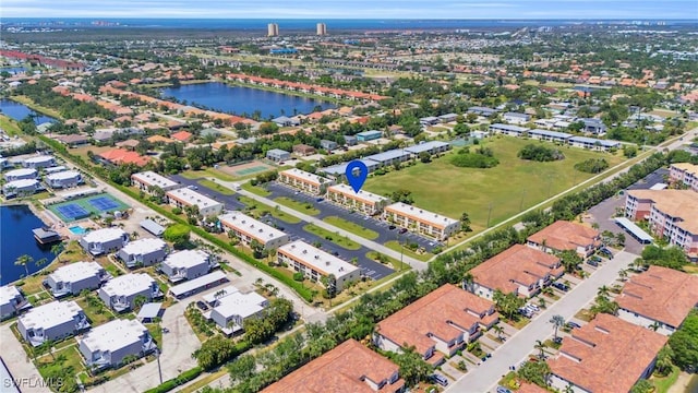 drone / aerial view with a water view