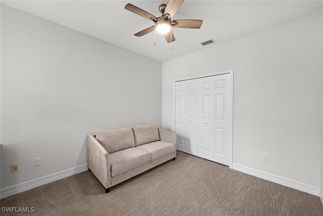 unfurnished room with carpet floors and ceiling fan