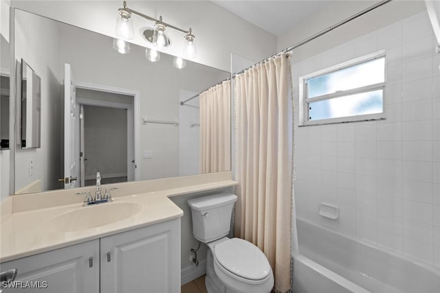 full bathroom featuring vanity, shower / tub combo, and toilet