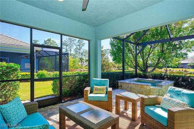 sunroom / solarium with ceiling fan