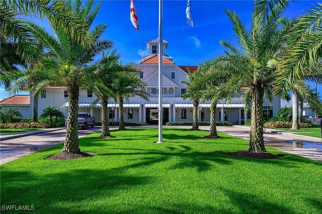 surrounding community featuring a yard