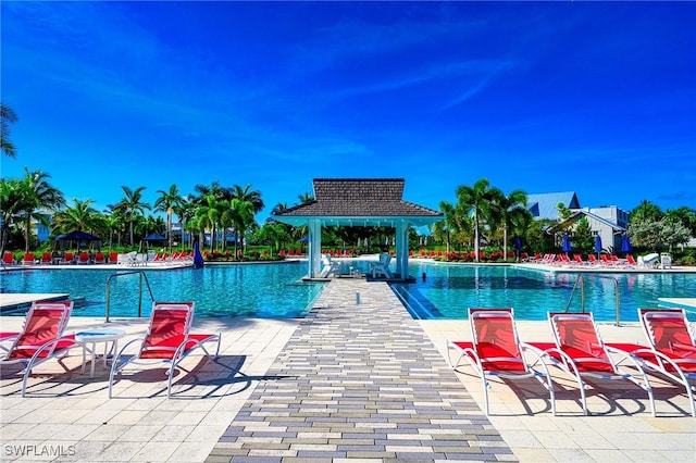 view of pool with a gazebo and a patio area