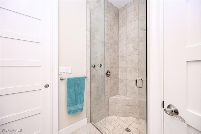 bathroom featuring an enclosed shower