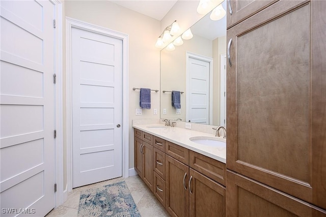 bathroom featuring vanity and tile patterned flooring