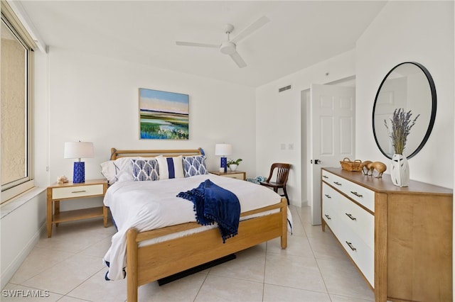 bedroom featuring ceiling fan and light tile patterned floors