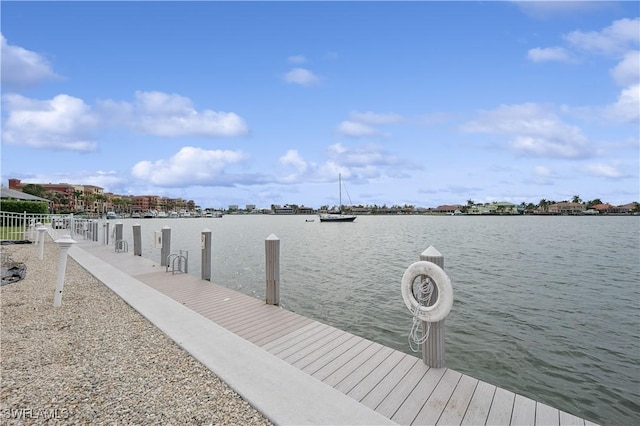 view of dock with a water view