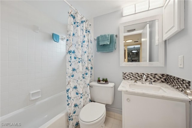 full bathroom featuring tile patterned flooring, backsplash, vanity, shower / bath combination with curtain, and toilet