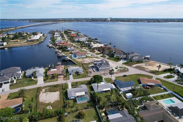 bird's eye view with a water view