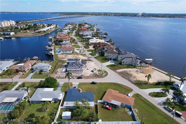 bird's eye view with a water view