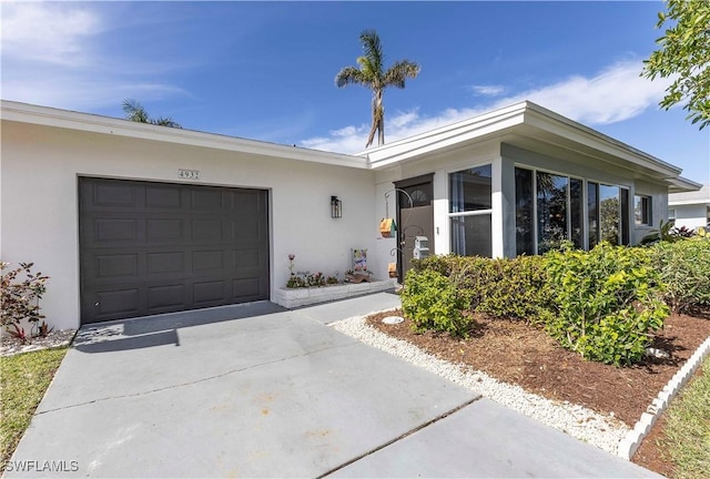 property entrance with a garage