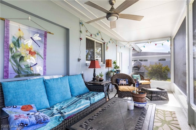 sunroom with ceiling fan and a wealth of natural light