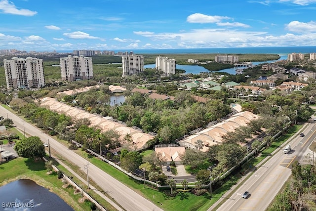 bird's eye view with a view of city and a water view