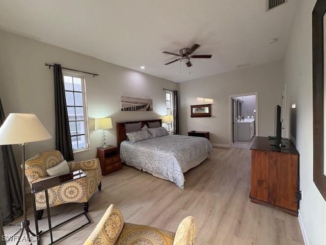 bedroom with ceiling fan and light hardwood / wood-style flooring