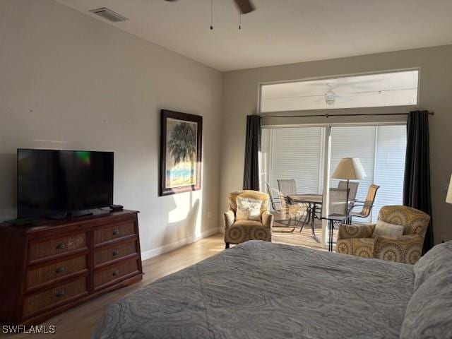 bedroom featuring light hardwood / wood-style flooring and ceiling fan