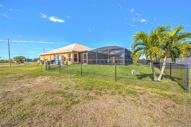 view of yard with a lanai